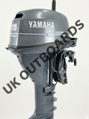 A side profile view of a clean, serviced 2002 Yamaha 15HP four-stroke engine, displaying the complete powerhead and transom bracket assembly where boat owners can easily swap out damaged yamaha outboard boat parts.