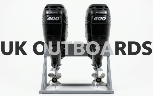 A matched pair of glossy black 2024 Mercury Verado 400hp L-6 four-stroke outboard motors with 25-inch shafts mounted on shipping crates, showcasing the sleek supercharged inline-6 engine cowlings and stainless steel propellers for buyers seeking premium Mercury 400hp outboards.