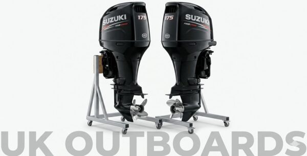 Close up showroom display of a clean suzuki 175hp outboards twin set featuring immaculate gloss black cowlings with factory silver decals, digital precision control markings, and high polish three blade stainless steel props.