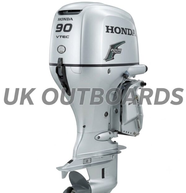 Immaculate Honda BF90 Outboard - 2022 90HP 4-Stroke EFI Marine Engine Left profile view of an immaculate honda bf90 outboard motor showcasing its glossy metallic silver engine cowl, original factory decals, sleek lower gearcase, and clean integrated hydraulic power trim assembly.